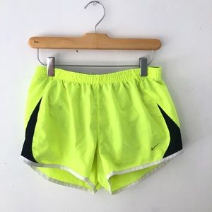 Yellow Nike running shorts